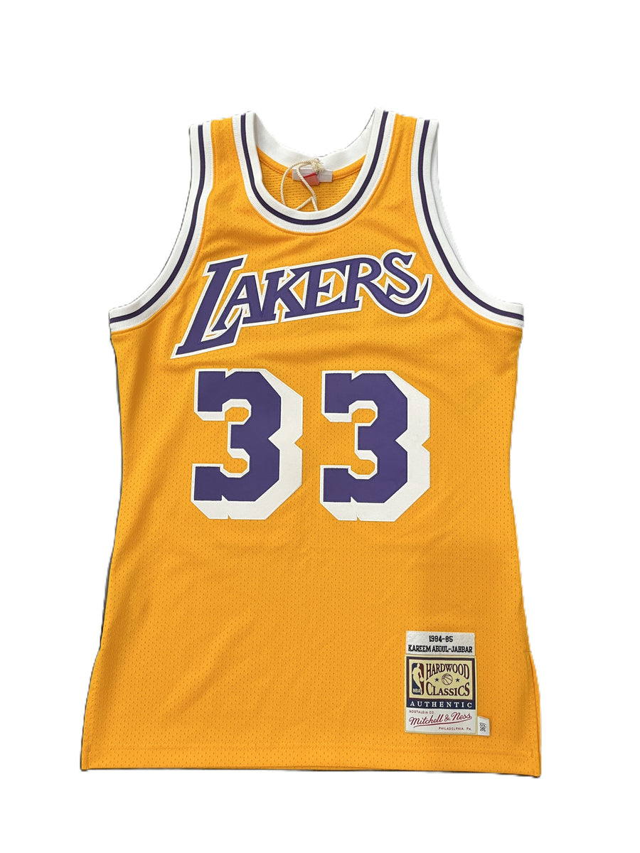 Mitchell & Ness Los Angeles Lakers Kareem Abdul-Jabbar Home Jersey 1984-1985 Yellow